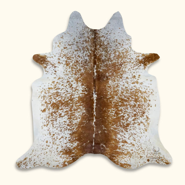 Texas Range brown and white cowhide rug - premium quality hide for rustic decor.