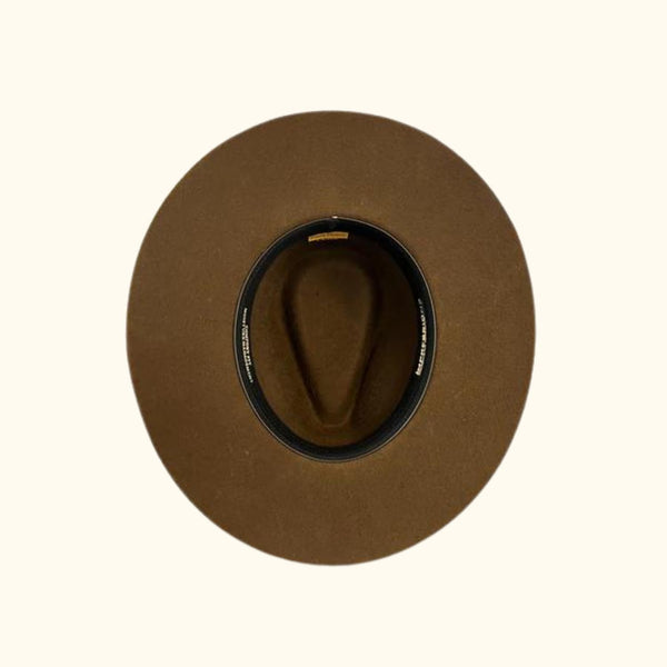 Inside bottom view of a Brown Western Hat, featuring a comfortable sweatband.