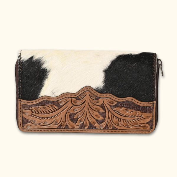 Front view of the Canyon Blossom Leather Wallet, featuring hand-tooled floral designs and genuine hair-on cowhide accents.