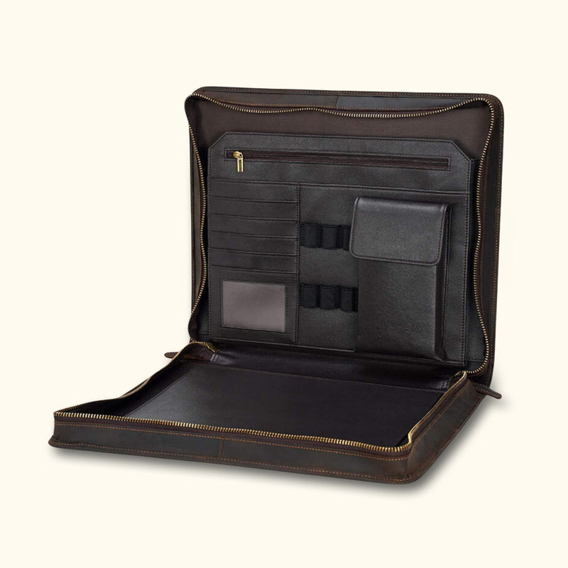 Interior view of the Desperado Leather Tablet Case, showcasing multiple compartments including card slots, pen loops, a transparent ID window, a zippered pocket, and a dedicated tablet slot, all designed to efficiently organize office essentials.