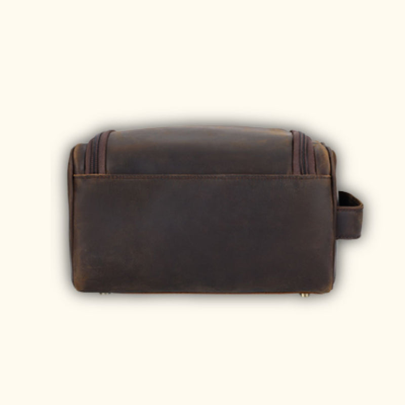 Back view of the High Plains Leather Toiletry Bag highlighting its smooth full-grain leather design and sturdy build.