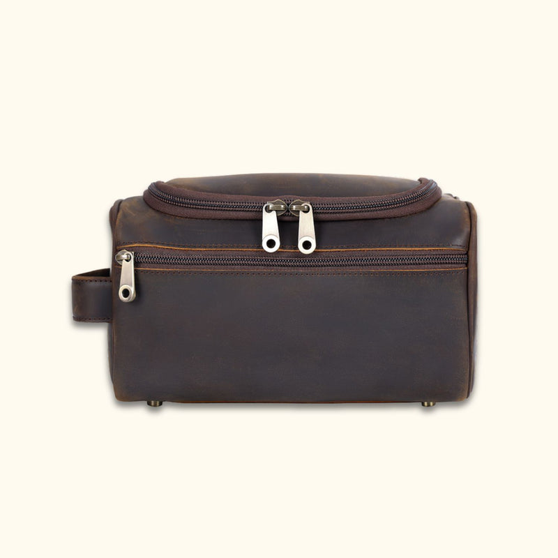 Front view of the High Plains Leather Toiletry Bag with full-grain leather and dual-zipper compartments.