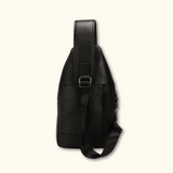 Back profile view of the Western Adventure Leather Sling Bag, featuring the adjustable strap and back zipper pocket.