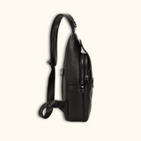 Side profile view of the Western Adventure Leather Sling Bag, showing the adjustable strap and slim design.