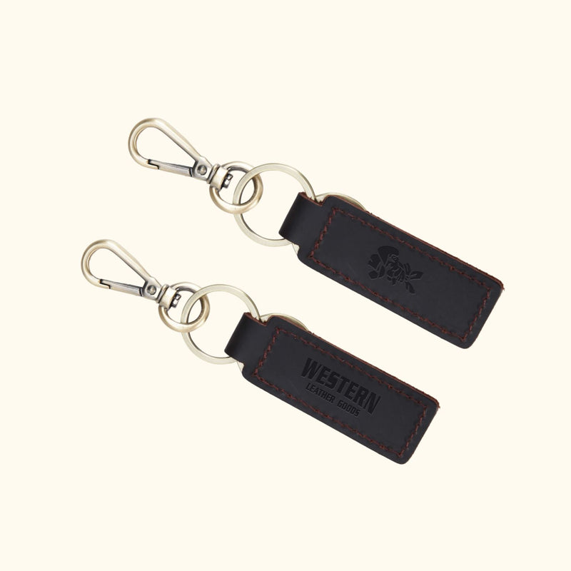 Western Leather Keychain in dark brown with silver hardware, showcasing a classic design and stamped logo.