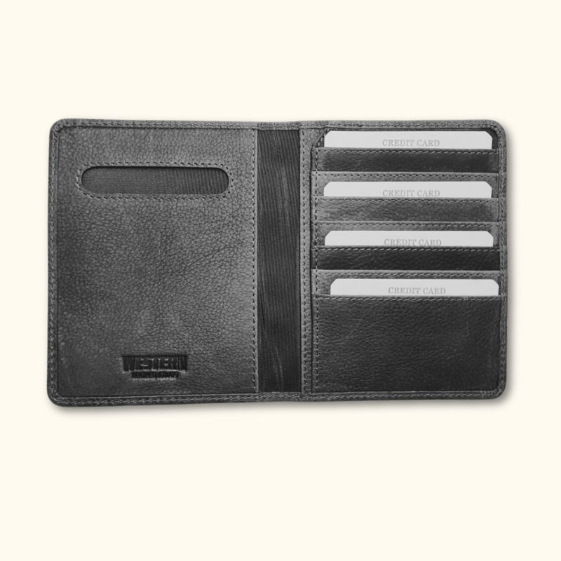 Open view of The Western Traveler Leather Passport Holder in black, displaying the card slots and spacious passport compartment.