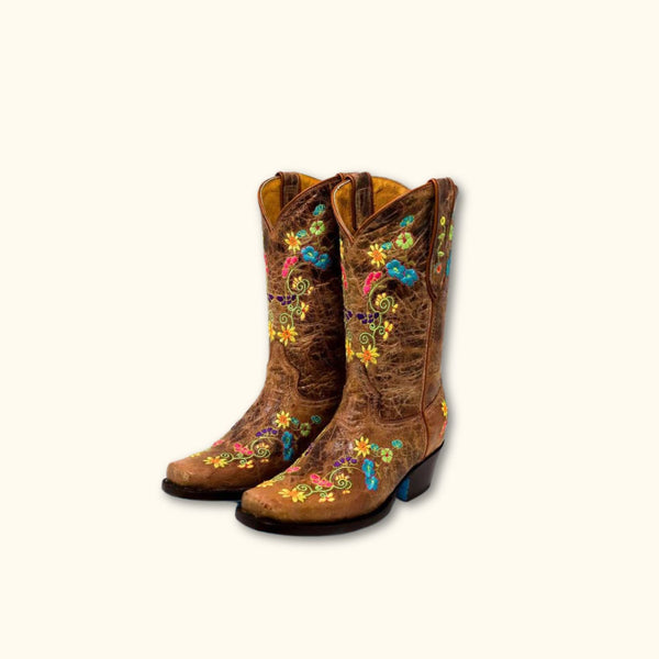 Pair of Wildflower Bliss Leather Cowgirl Boots featuring vibrant floral embroidery and genuine leather craftsmanship.